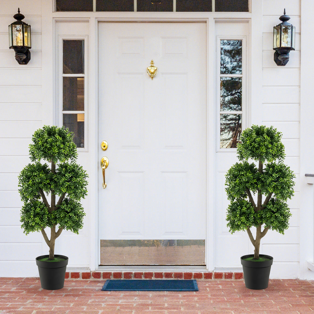 Two 45-inch artificial boxwood topiary ball trees with lush green leaves, placed on a front porch for decorative appeal.