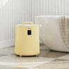 Yellow 18L towel warmer with LED display, accommodating large towels, ideal for cozy warmth in bathrooms.