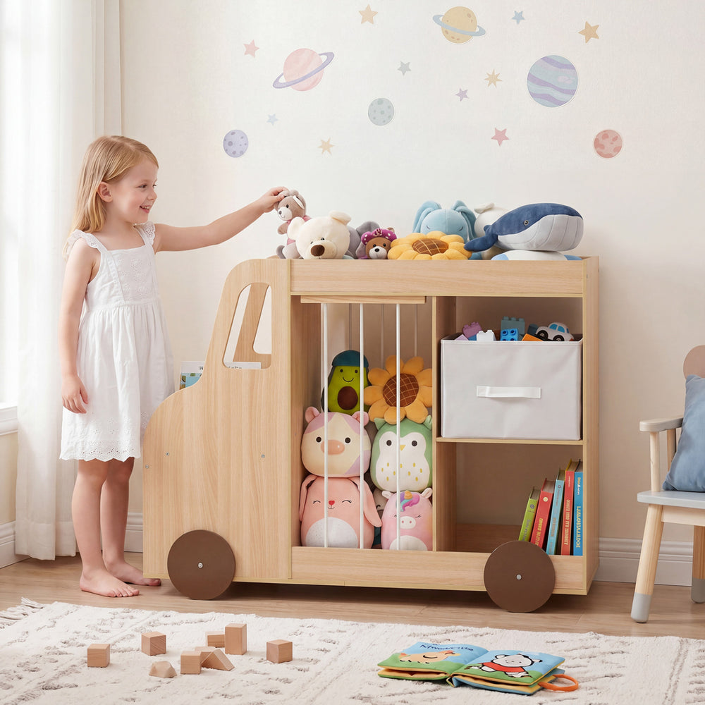 Toy storage organizer in car shape with plush toy storage, fabric drawer, and wheels for easy mobility in a playroom.