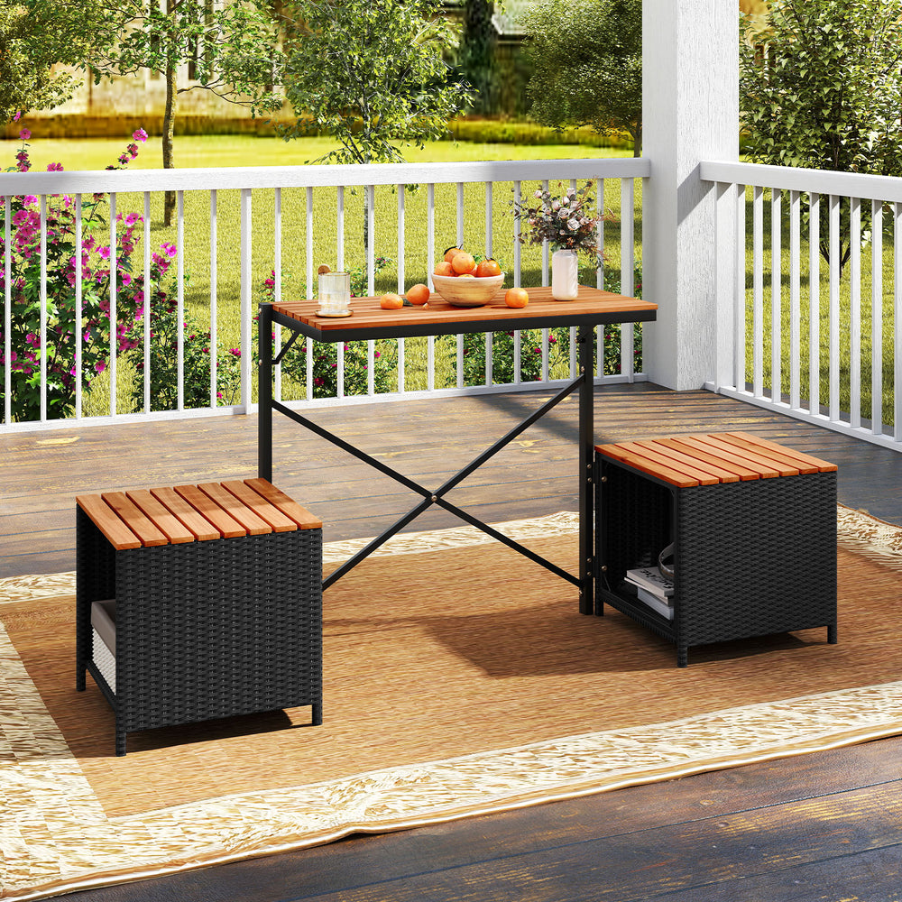 Transforming picnic table with two storage chairs, made of acacia wood and PE rattan, perfect for outdoor patios.