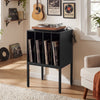 Turntable record player stand in black with power outlets, holding vinyl records and a turntable on a spacious tabletop.