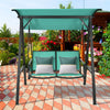 Two-person patio swing with green weather-resistant canopy, perfect for garden relaxation and sun protection.