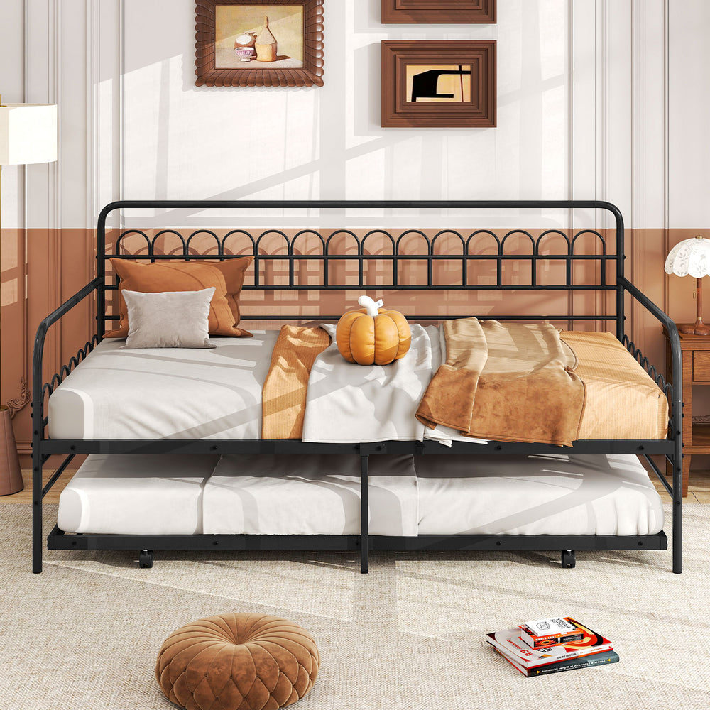 Twin daybed with a stylish curved backrest in black, showcasing a cozy arrangement for reading or relaxing in any room.