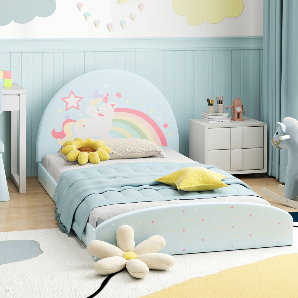 Twin floor bed frame with unicorn design, soft headboard, and blue upholstery, perfect for kids' independence and.