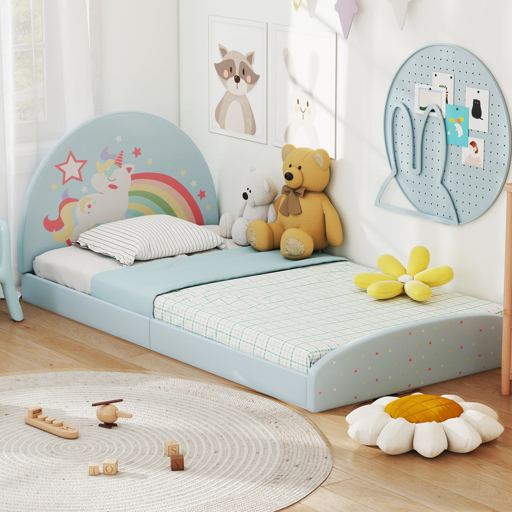Twin floor bed frame with a unicorn design, soft headboard, and included 210D Oxford cloth mat for kids' comfort.
