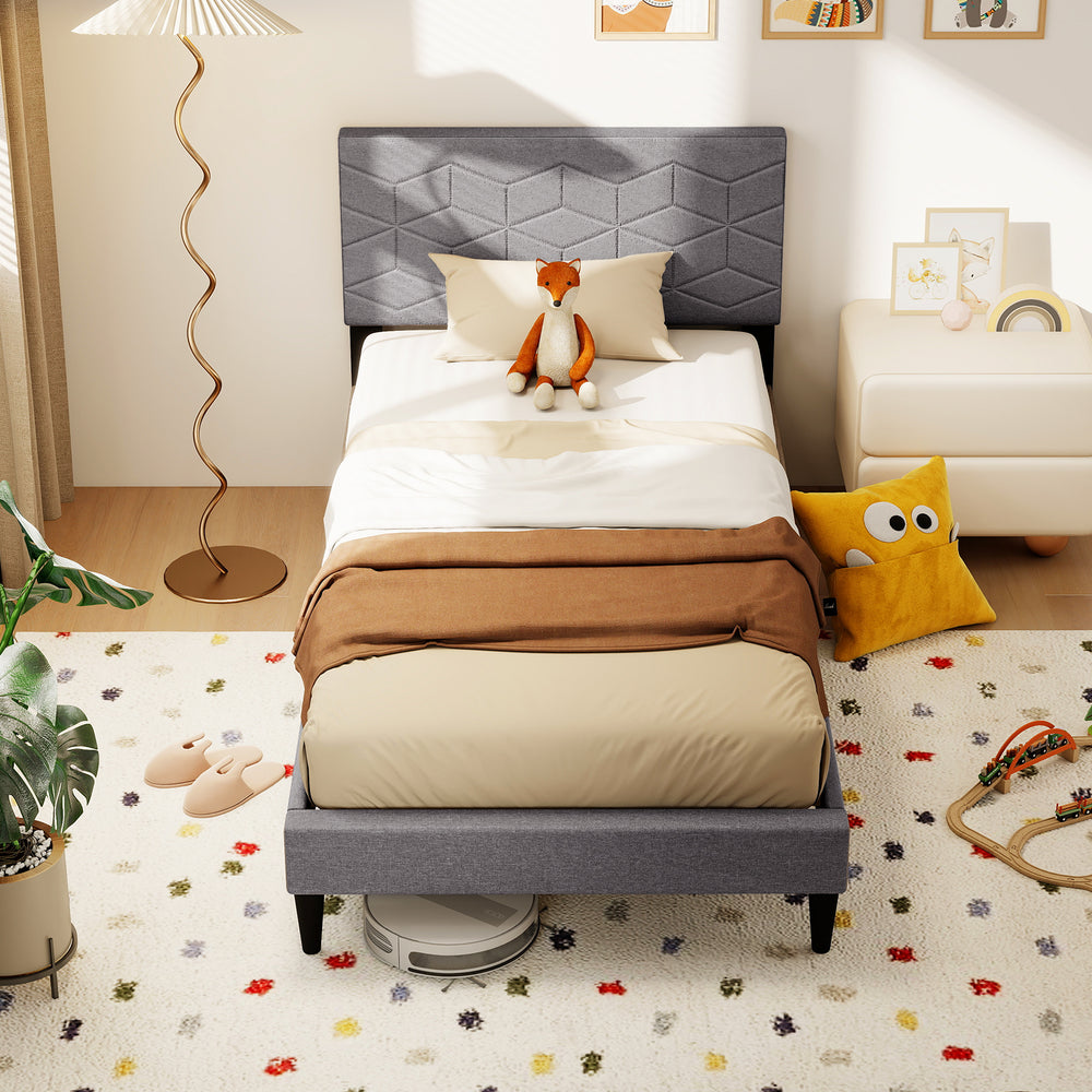 Twin size bed frame with upholstered headboard in linen fabric, featuring geometric quilting and low-profile design for.