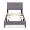 Modern twin bed frame with upholstered linen fabric headboard and geometric quilting, designed for comfort and style.