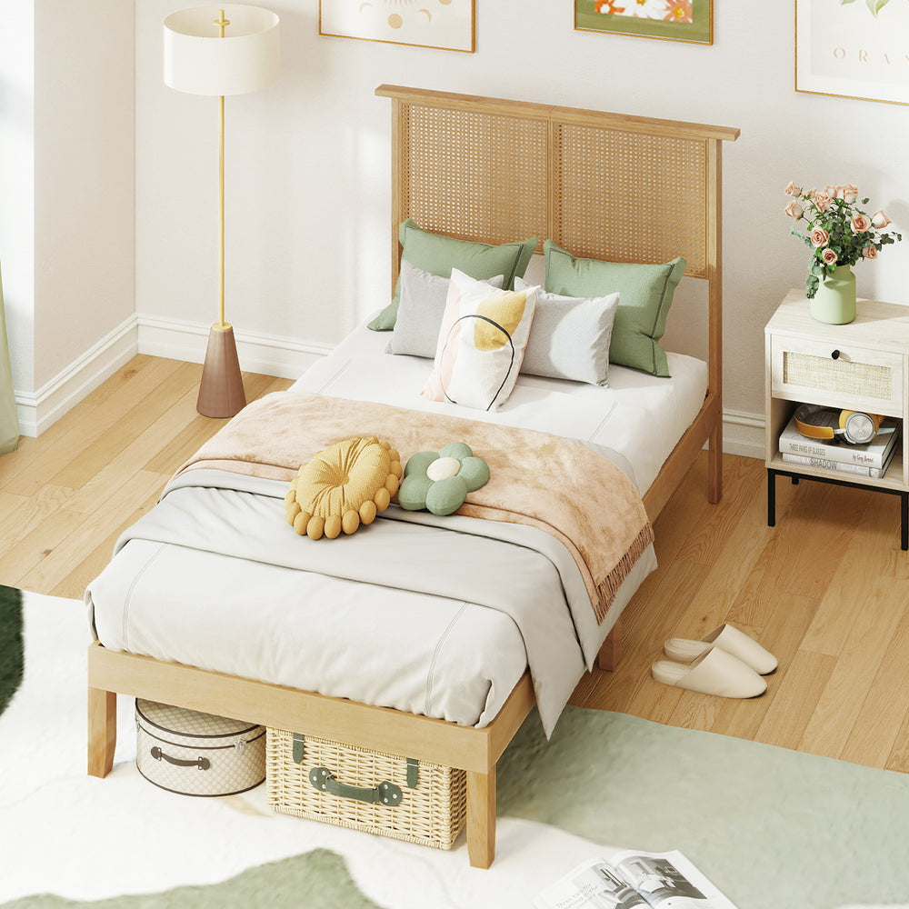 Twin size bed frame with boho rattan headboard, solid wood legs, and ample under-bed storage for a stylish bedroom.