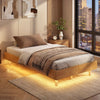 Floating bed frame with LED lights, solid rubber wood legs, and 6-inch clearance for stylish bedroom storage.