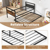 Twin metal daybed with trundle, featuring powder-coated slats and lockable wheels, ideal for living room or guest room.