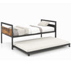 Twin metal daybed with trundle on lockable wheels, featuring sturdy slats and an industrial design for versatile use.