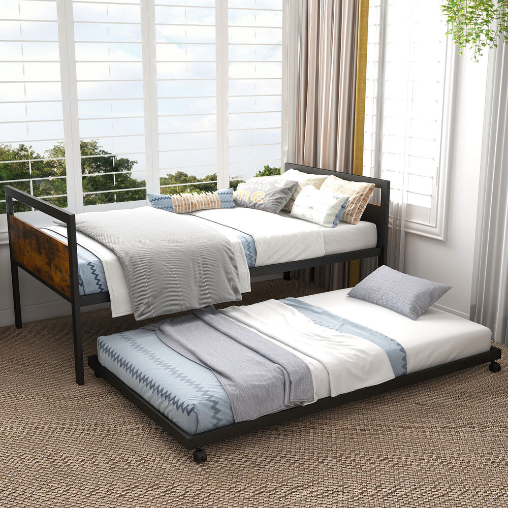 Twin metal daybed with trundle, featuring lockable wheels and a sturdy design, perfect for bedrooms or guest rooms.