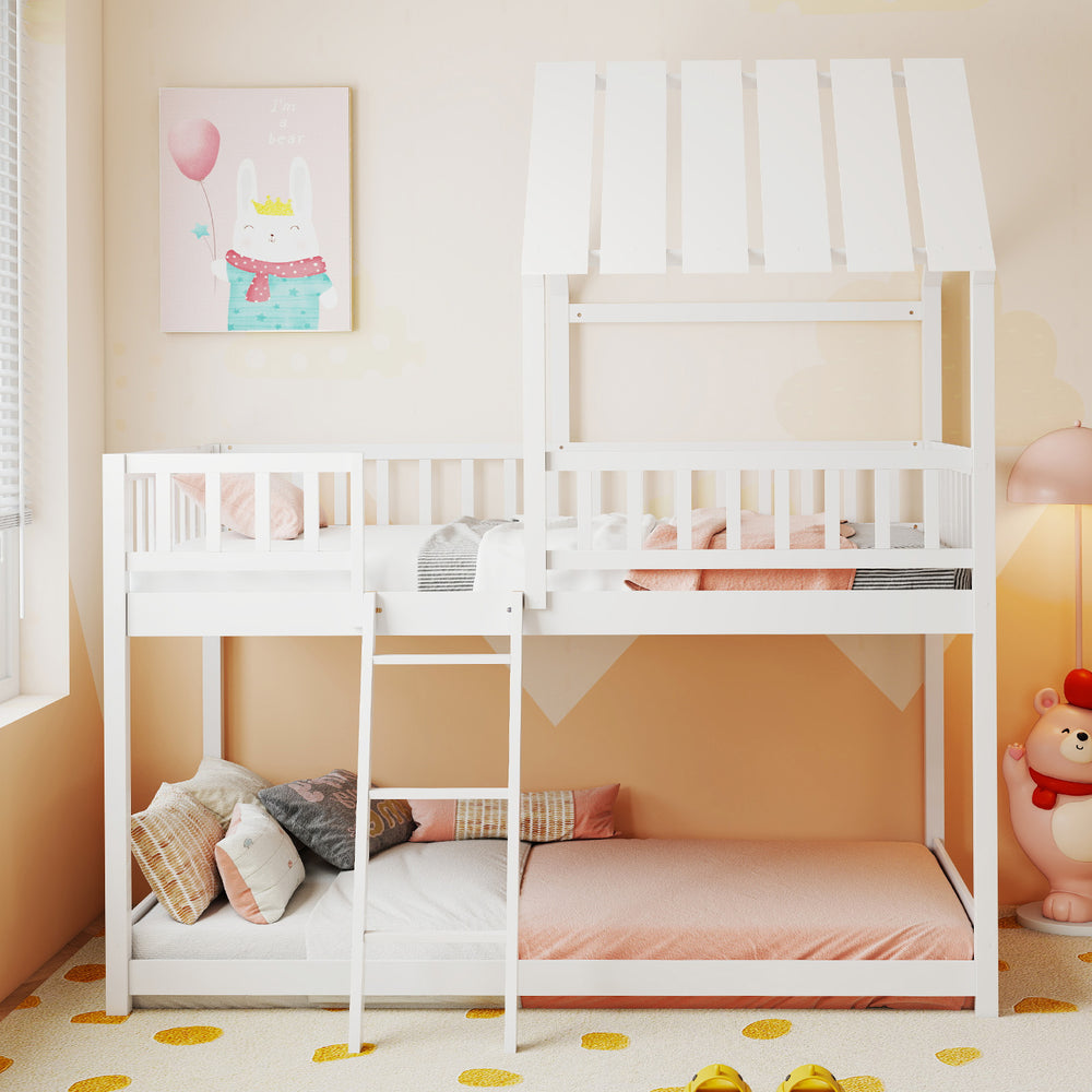 House-shaped twin over twin bunk bed in white, featuring a low-to-ground design for easy access and added safety for.
