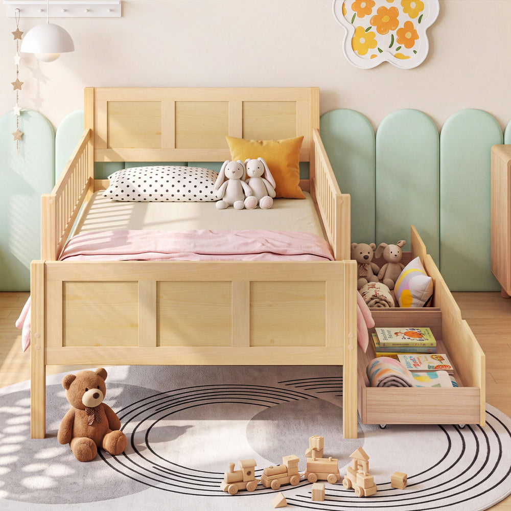 Twin size bed frame with natural wood finish, featuring detachable guardrails and two large storage drawers for toys.