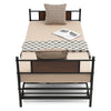 Twin size daybed frame with pullout trundle, featuring a sturdy steel design and cozy bedding for versatile sleeping.