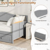 Twin size gray daybed with trundle, featuring integrated armrests and curved backrest for versatile use in any room.