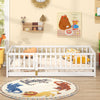 Twin size floor bed in white with high fence and door, designed for kids' safety and independence in play and sleep.