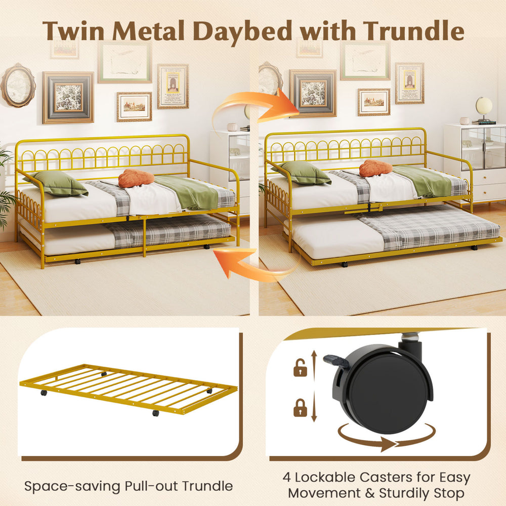 Twin size golden metal daybed with pull-out trundle and lockable wheels, ideal for maximizing space in guest rooms.
