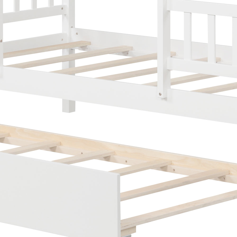 Twin size house bed frame in white with trundle, featuring slats and a whimsical roof design for imaginative play.