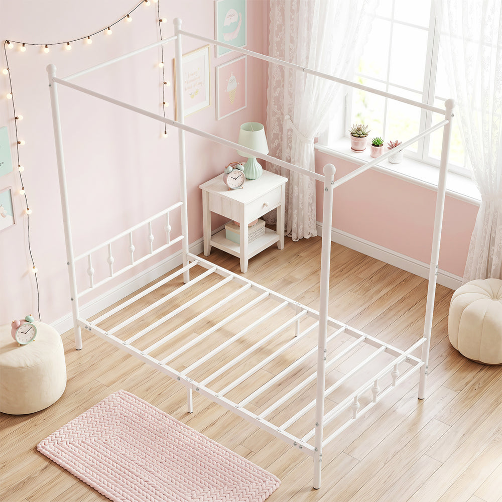 Twin size white metal canopy bed frame with headboard and footboard, featuring decorative accents and ample under-bed storage.
