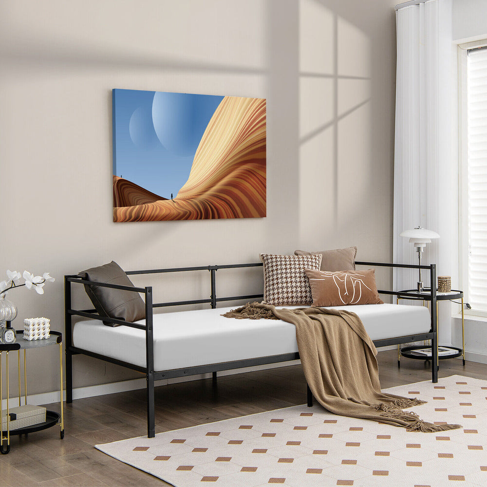Twin size metal daybed frame in modern style, featuring sturdy slats and non-slip foot pads, ideal for living room or.