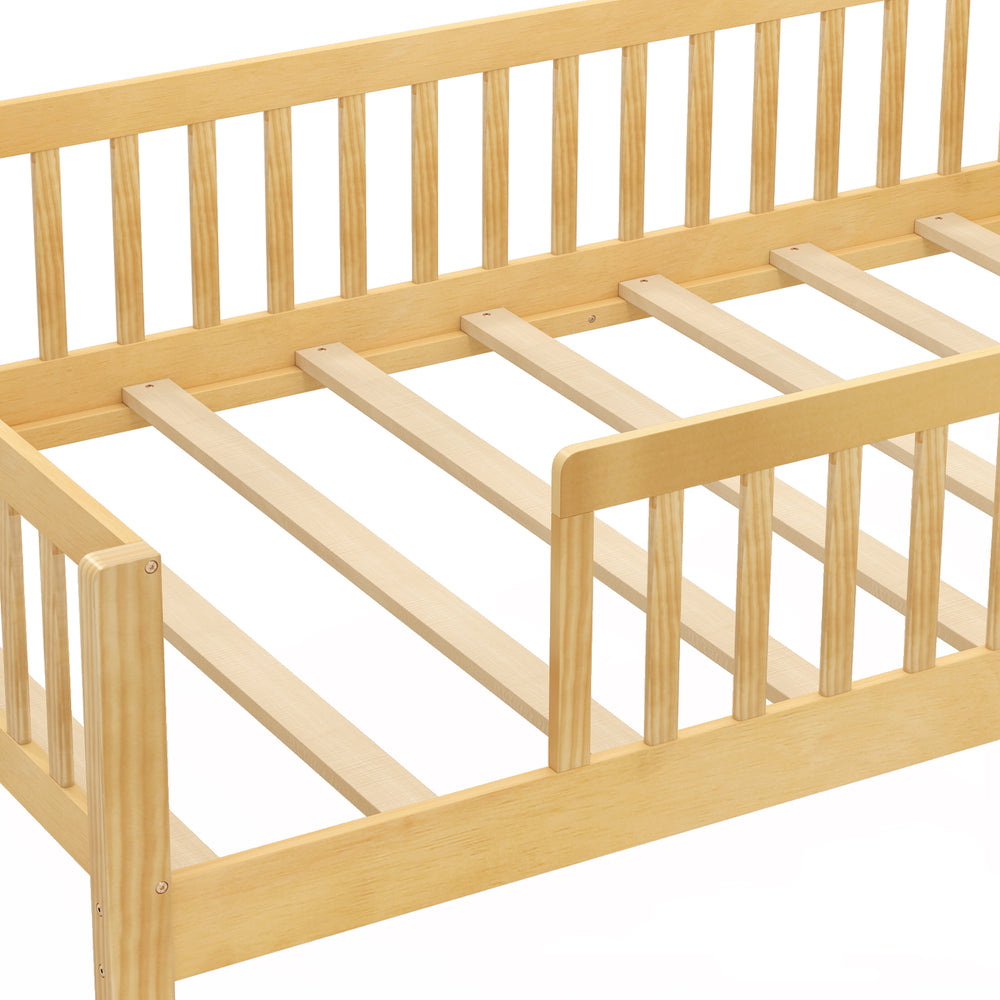 Twin size kids Montessori bed frame in natural pine wood with house-shaped headboard and built-in storage shelf.