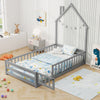 Twin size Montessori floor bed in gray with house shape, full-length guardrail, and lockable door for children's safety.