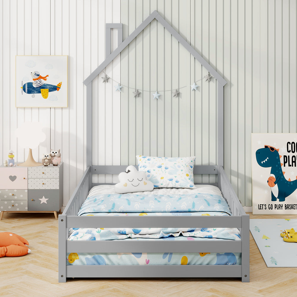 Twin size Montessori floor bed in gray with house shape, full-length guardrails, and lockable door for safe sleeping.