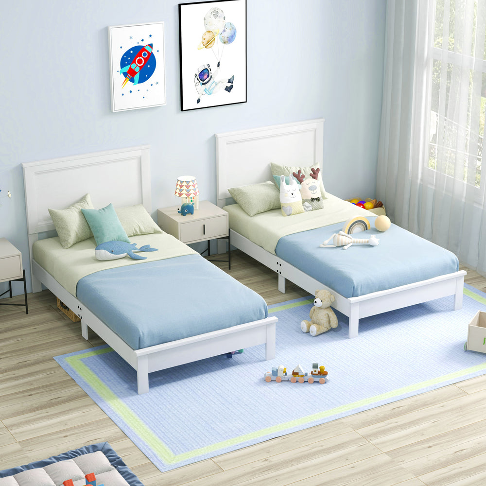 Twin size wooden bed frames in white with headboards, featuring slat support and ample under-bed storage.