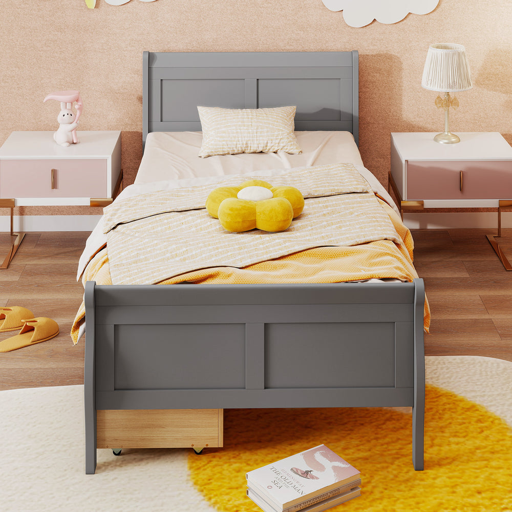 Twin size gray sleigh bed with stylish headboard and two storage drawers for efficient bedroom organization.