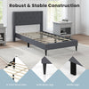 Twin size upholstered platform bed in gray with button tufted headboard and solid wood legs, ideal for bedroom storage.