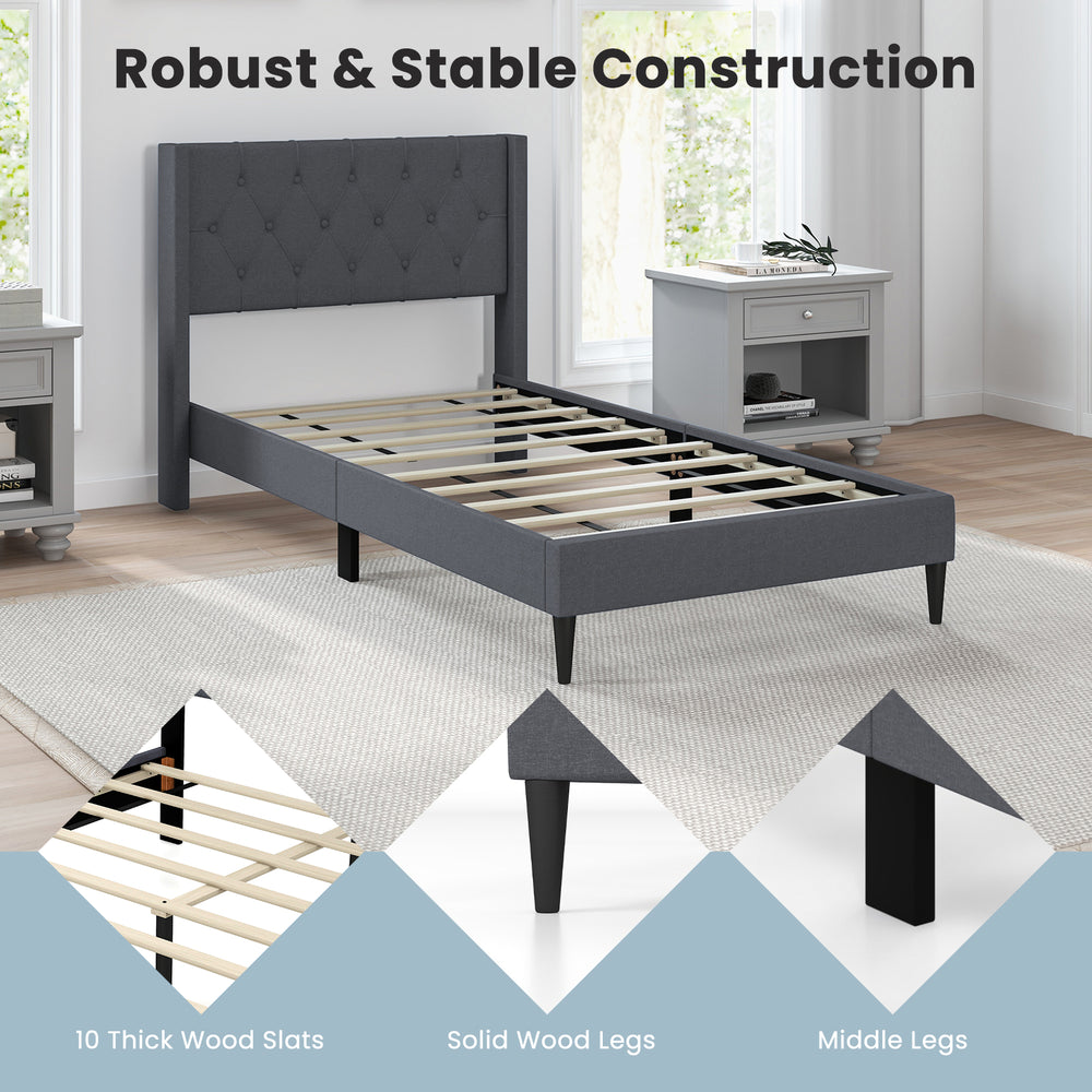Twin size upholstered platform bed in gray with button tufted headboard and solid wood legs, ideal for bedroom storage.