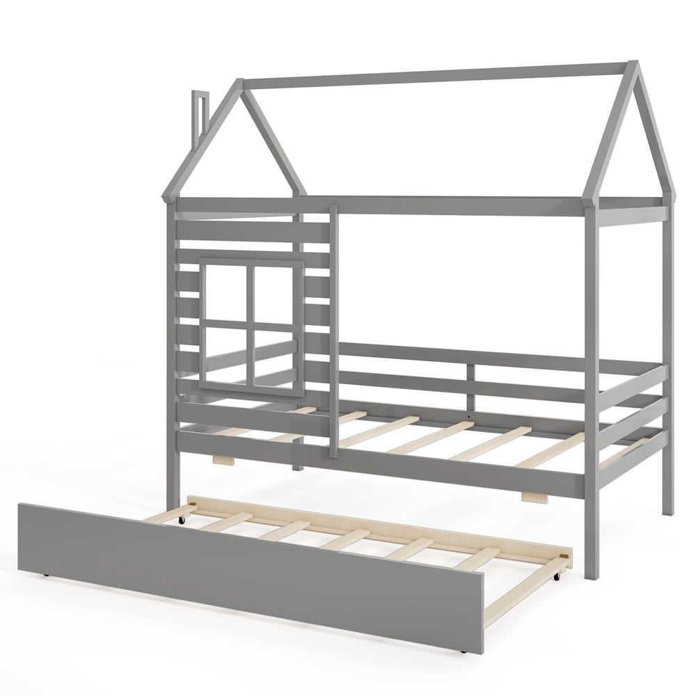 Twin size wooden platform house bed in grey with trundle, featuring a roof, chimney, and decorative window.