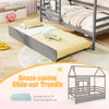 Space-saving slide-out trundle for twin size mattress under a grey wooden house bed with roof and guardrails.