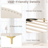 Detail of the upholstered daybed showing delicate rivet design, plywood slats, and corner metal legs for strong support.
