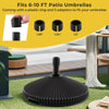Water and sand filled outdoor umbrella stand in black with shell texture, fits 6-10 ft umbrellas, includes 3 adapters.