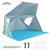 Portable UPF50+ beach umbrella tent in blue with pop-up design, zippered mesh windows, and included carrying bag.