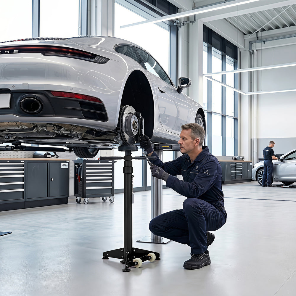 Underhoist support stand in black and red, featuring adjustable height and 0.75-ton capacity for vehicle component support.