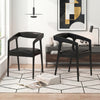 Set of 2 black upholstered armchairs with cozy backrest and padded seat cushions, perfect for modern living spaces.