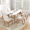 Upholstered dining chair in beige with a soft padded seat and curved backrest, showcasing durable rubber wood legs.