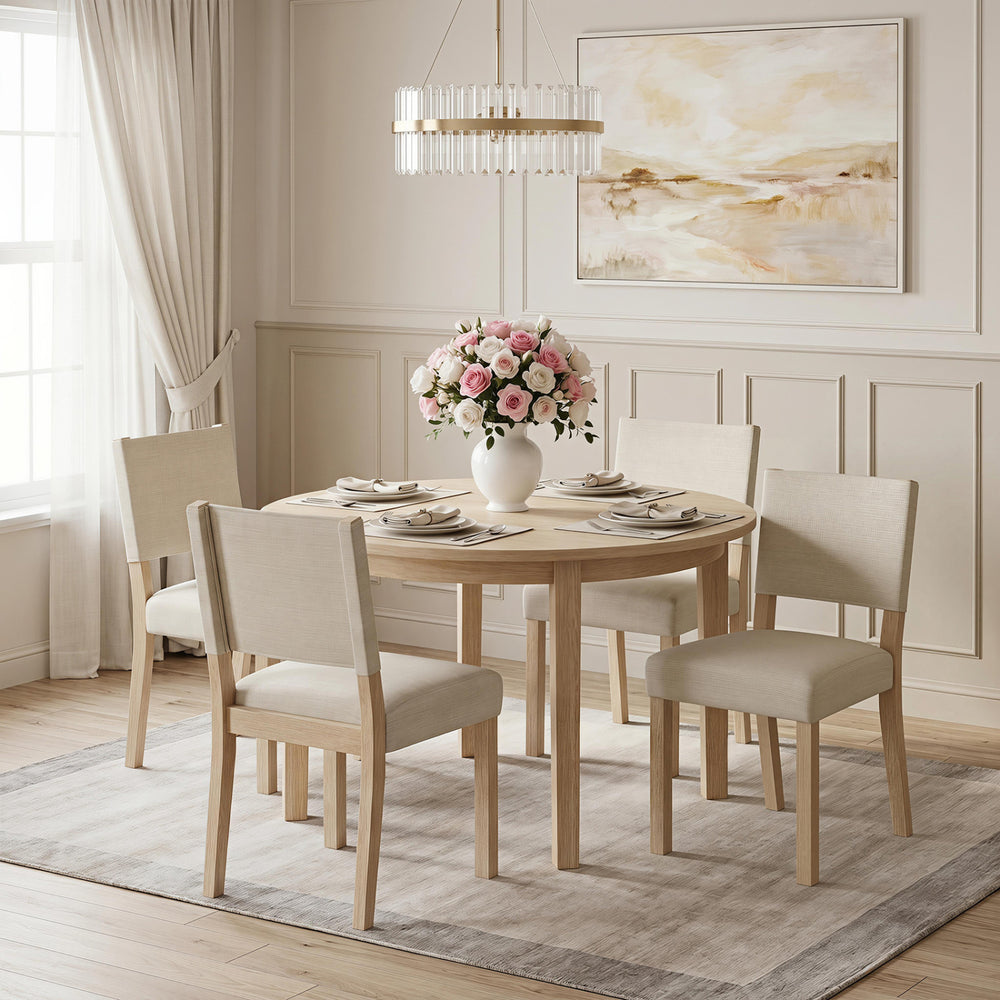 Upholstered dining chairs with solid rubber wood legs in beige, offering comfort and rustic style for dining rooms.