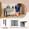 Upholstered entryway bench with gray padded seat, solid rubber wood legs, ideal for bedroom or living room use.