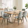 Gray upholstered dining chairs with sturdy metal legs and curved backrest, perfect for dining rooms and kitchens.