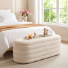 Upholstered fabric storage ottoman bench in white with lift-top lid, ideal for bedroom or entryway organization.
