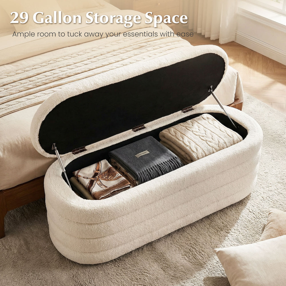 Upholstered fabric storage ottoman bench in white with 29-gallon capacity, ideal for blankets and cushions at the end.