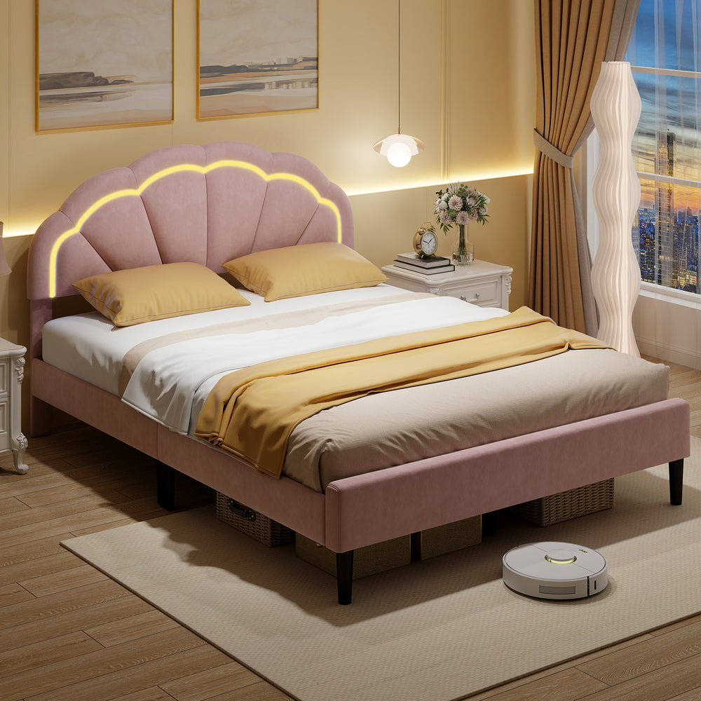 Upholstered pink LED bed frame with adjustable flower headboard, featuring sturdy metal support feet and ample.