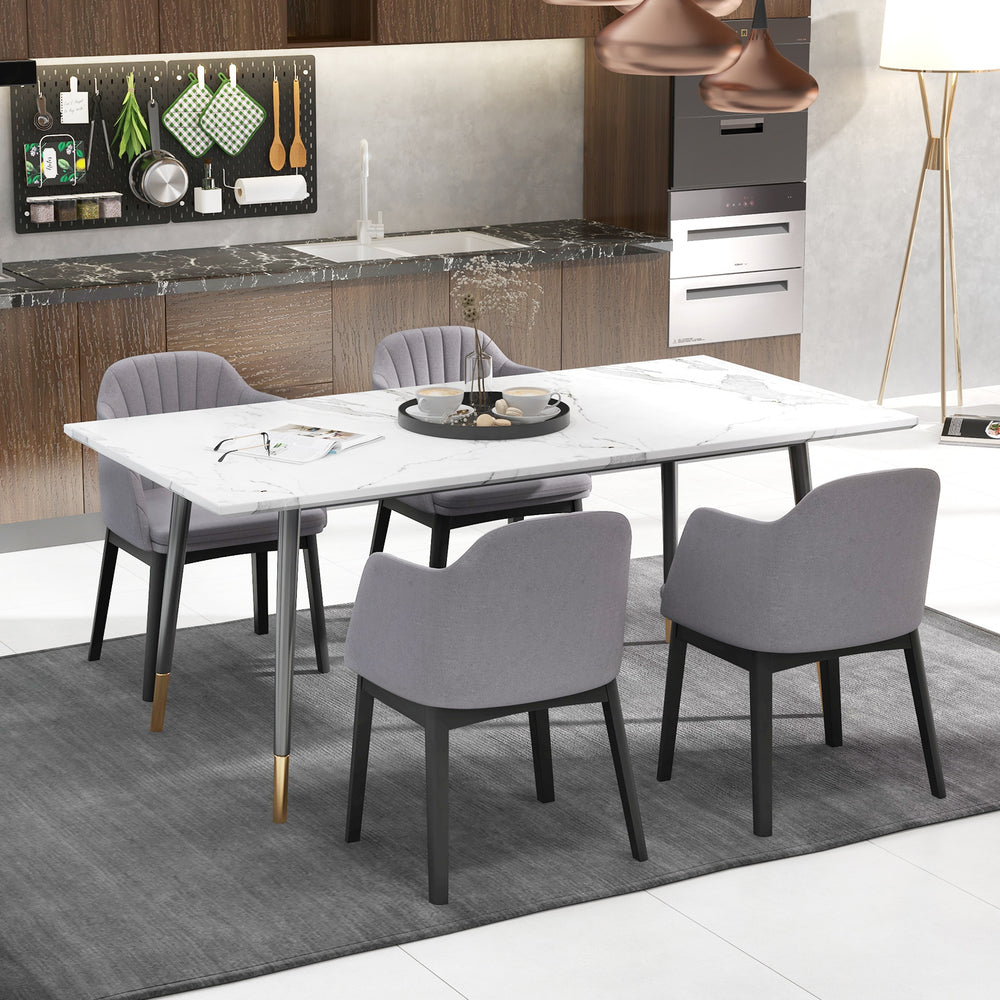 Modern dining table set featuring upholstered velvet accent chairs in grey, perfect for dining and relaxation.