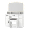 Vanity desk with curved mirror, 10 LED bulbs, and padded stool, featuring storage drawers and charging station in white.