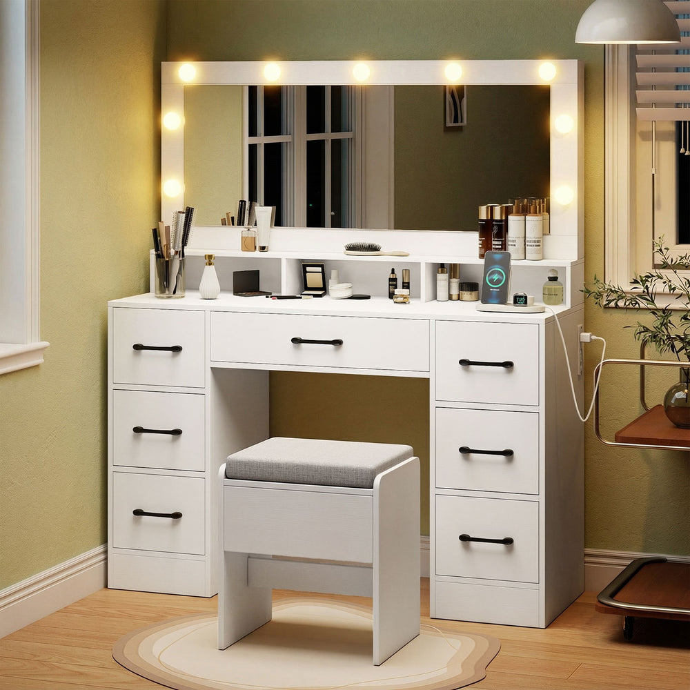 Vanity desk with LED mirror and lights, white finish, includes matching stool, ample storage, and built-in charging.