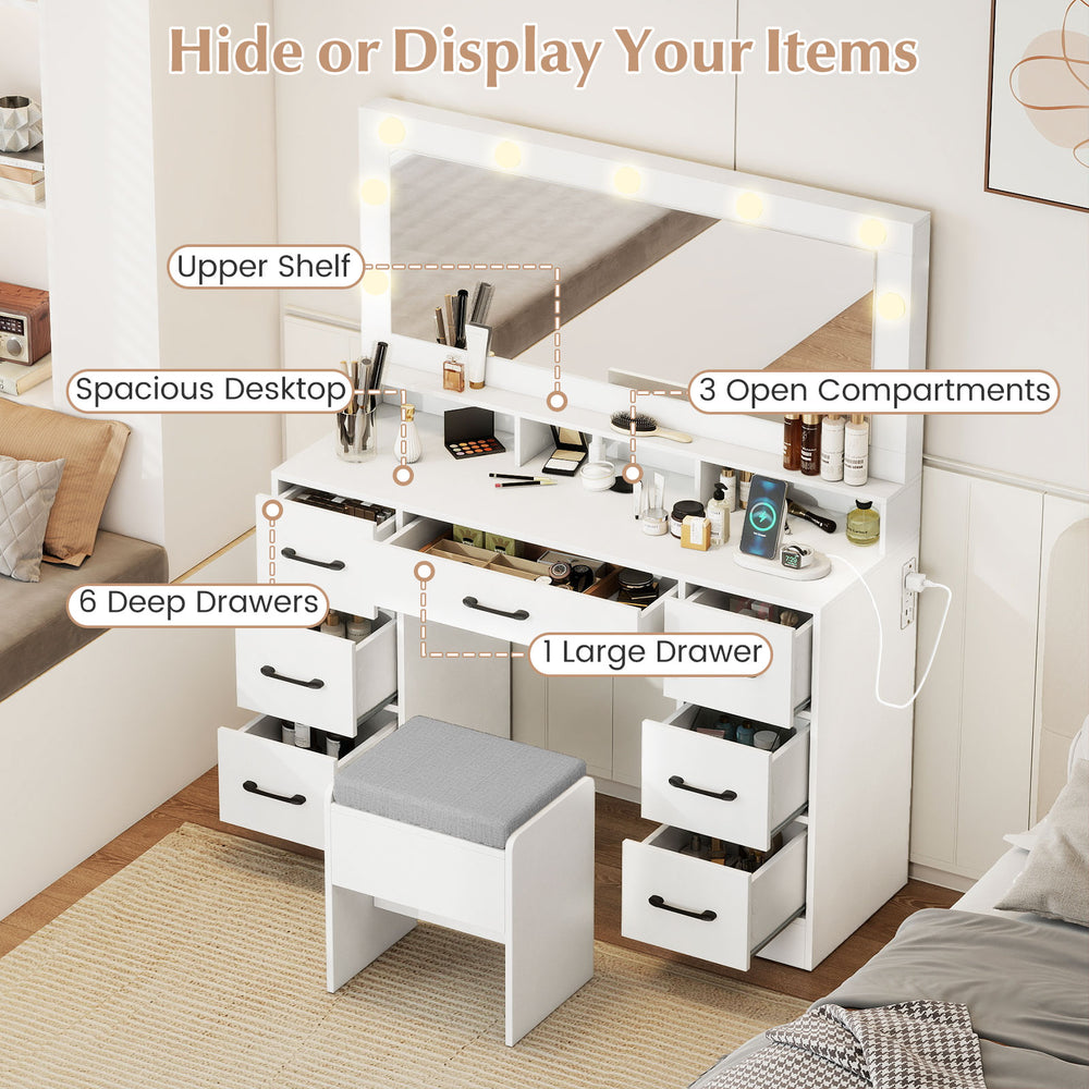 Vanity desk with mirror and lights, featuring 7 drawers, spacious desktop, and built-in charging station for makeup.